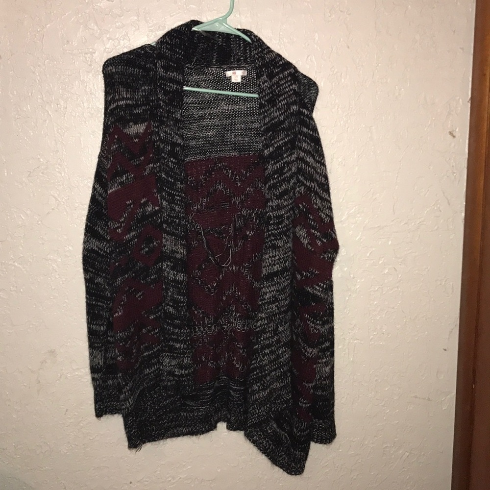 Black, gray, and maroon sweater